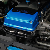 Demon Pro RS Barra oil feed and coolant line bracket installed near a Barra engine rocker cover