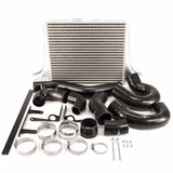 Process West Stage 3 Intercooler Kit including silver intercooler core, piping, hoses, and clamps, primarily in black color.